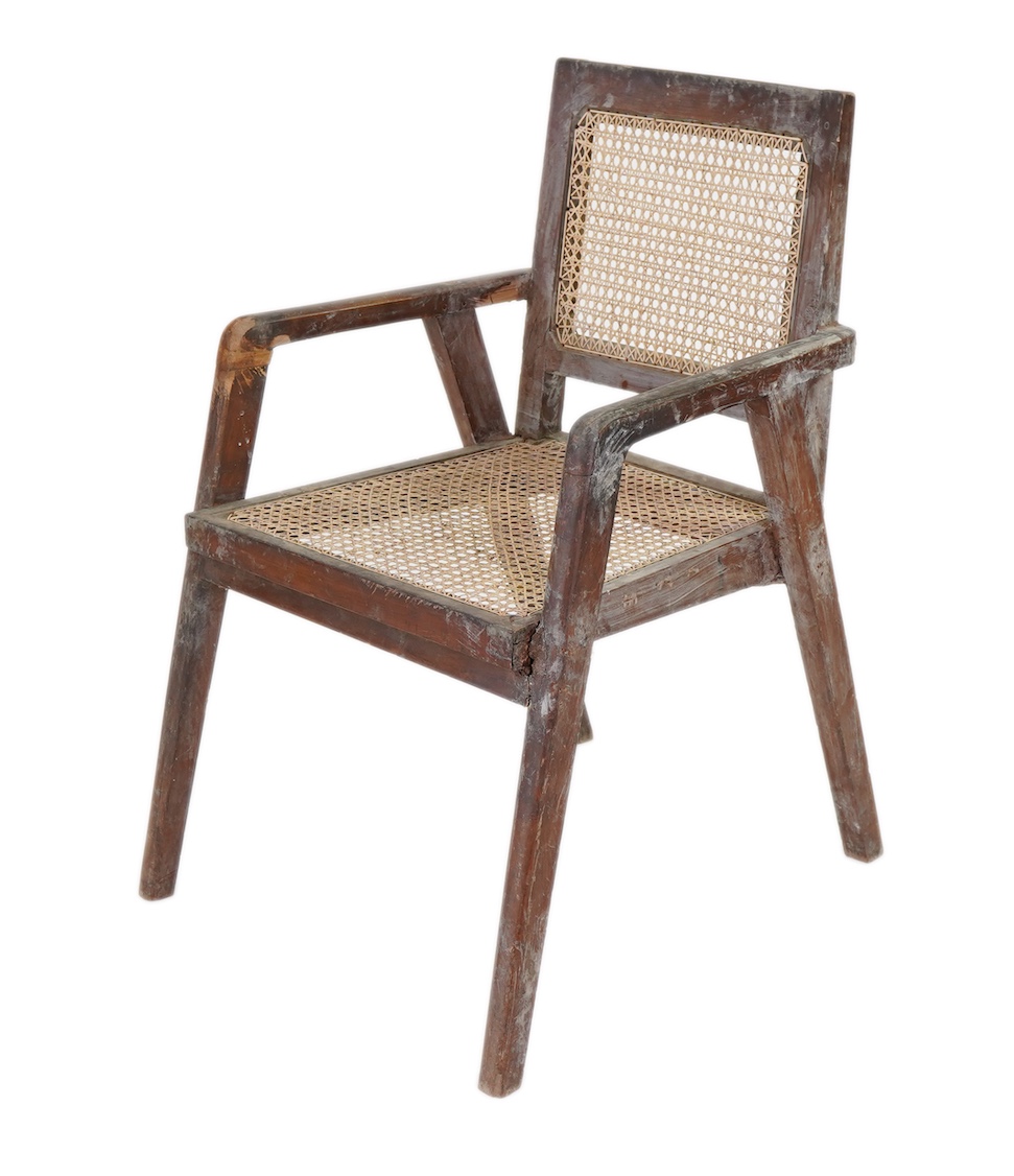 Manner of Pierre Jeanneret (Swiss, 1896-1967): A solid teak and braided canework armchair